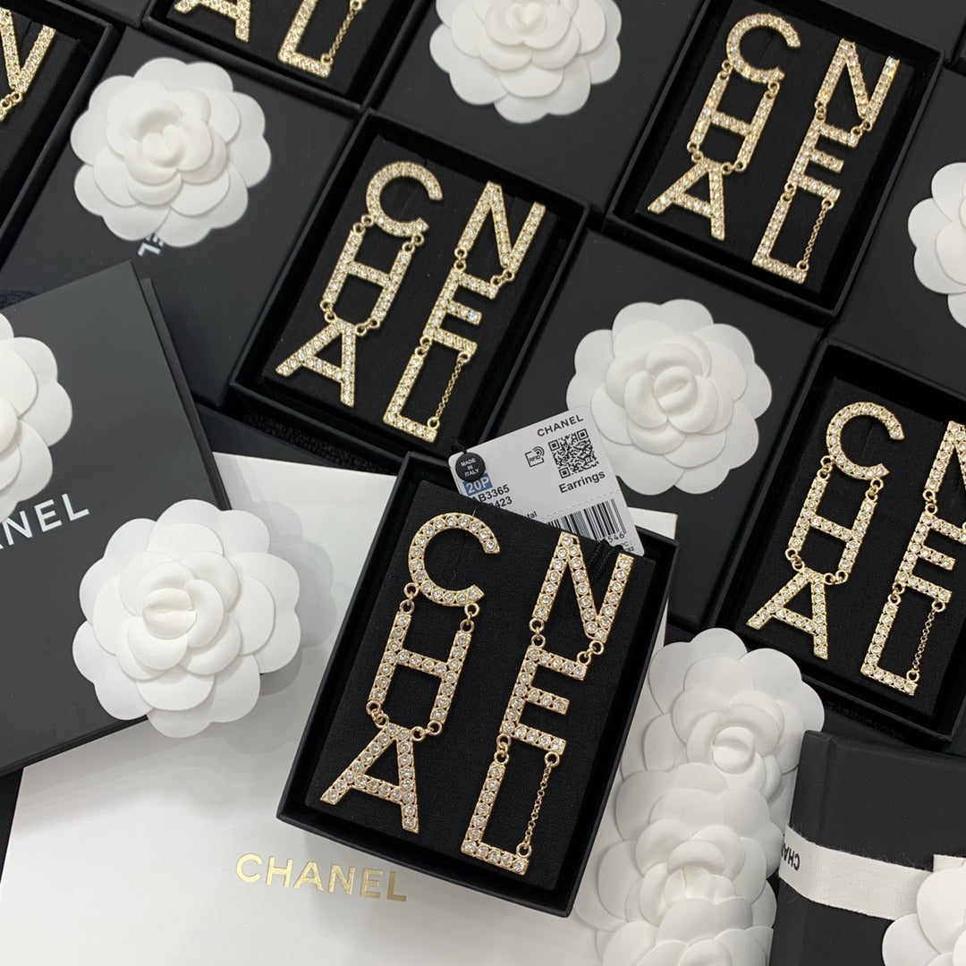 Chanel Brass & Sterling Silver Logo Earrings