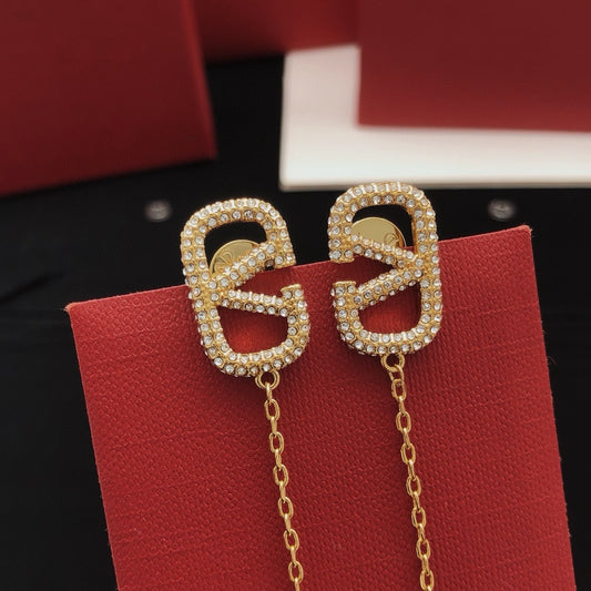 Valentino Brass Tassel Earrings
