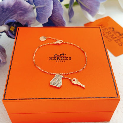 Hermes Brass Tassel Bracelet