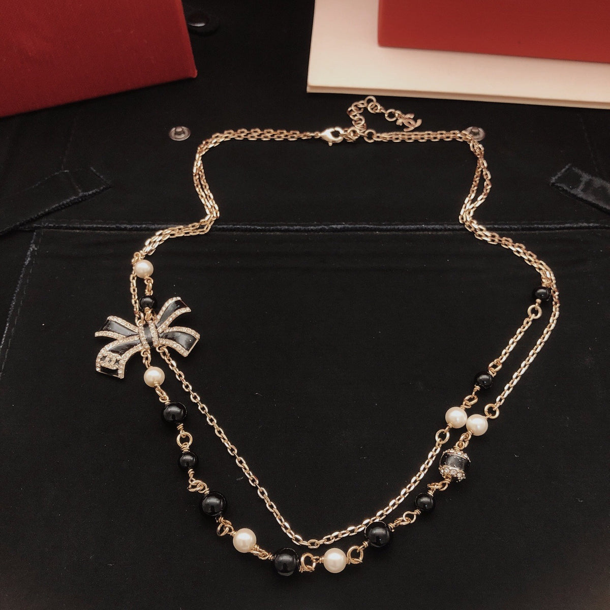 Chanel Black Brass Bow Necklace