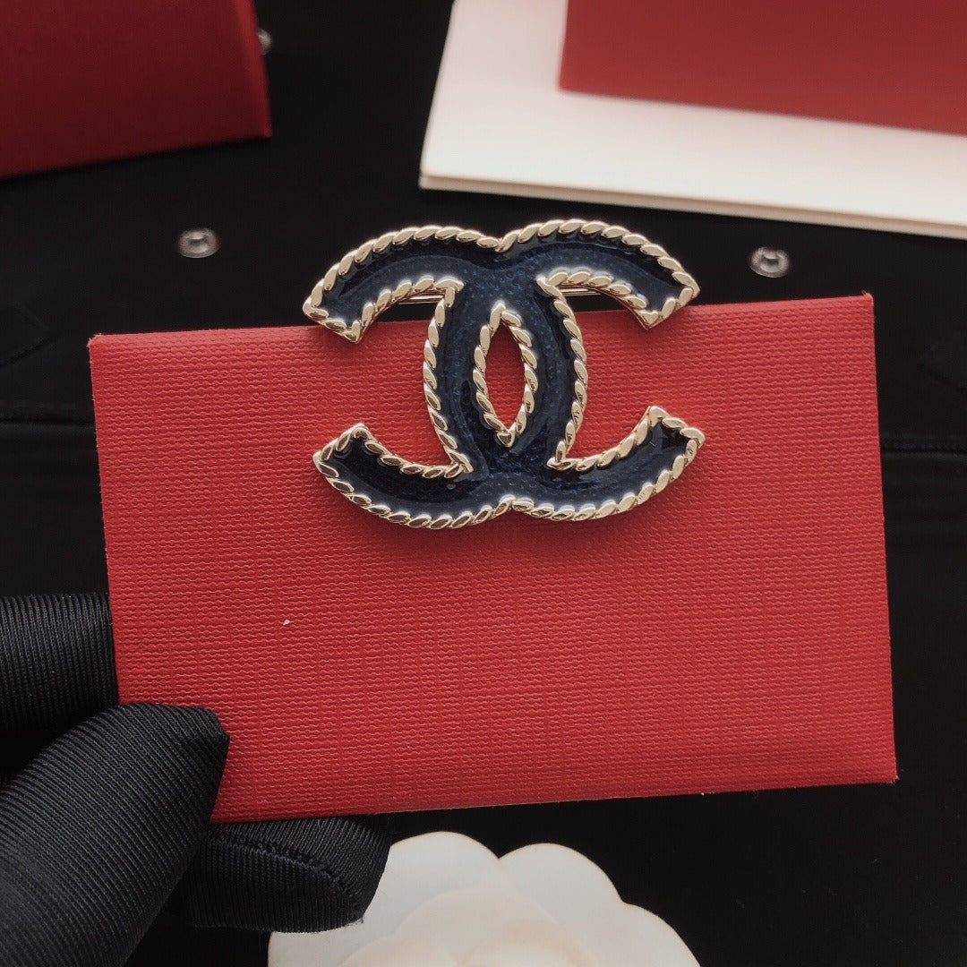 Chanel Brass Brooch