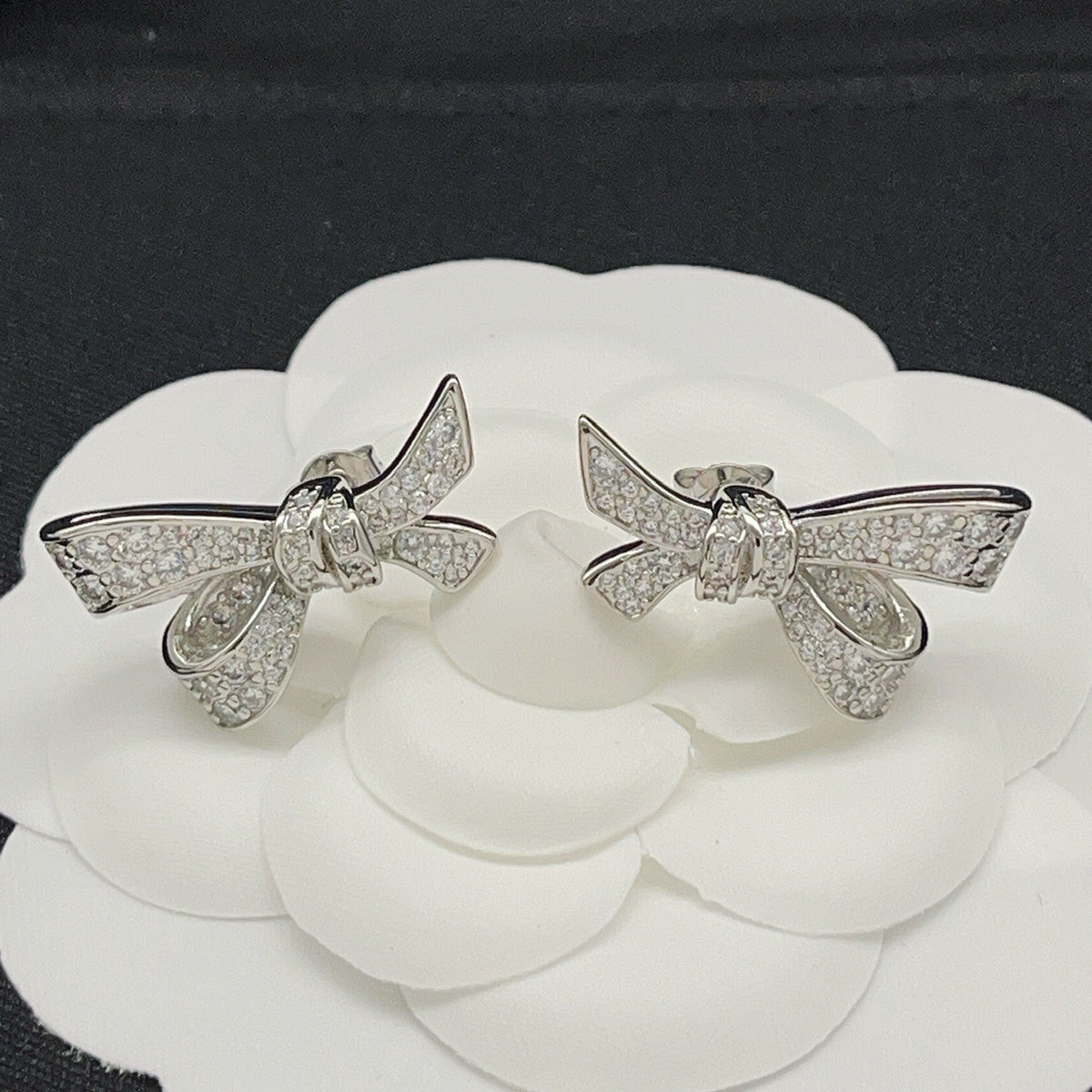 Graff Silver Brass Bow Earrings