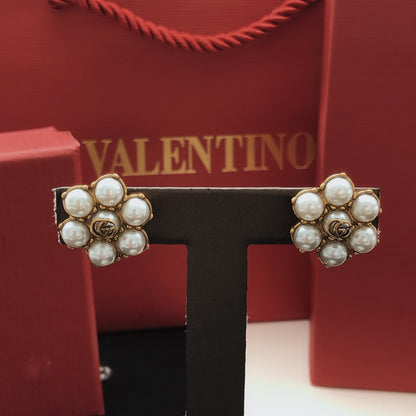 Gucci Gold Brass Floral Earrings