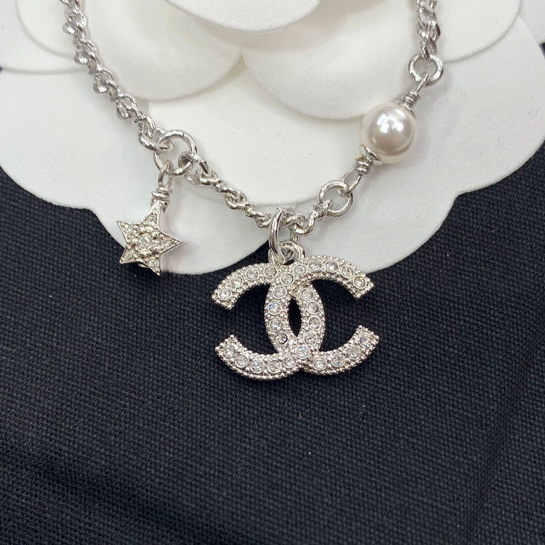 Chanel Brass Star Necklace
