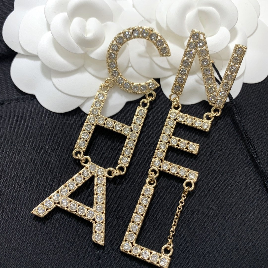 Chanel Brass & Sterling Silver Logo Earrings
