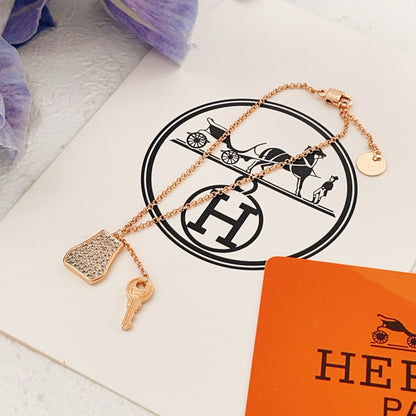 Hermes Brass Tassel Bracelet