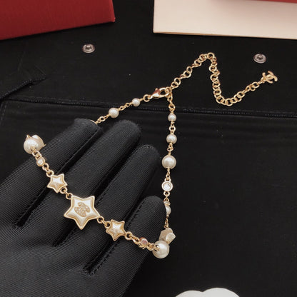 Chanel Brass Star Necklace