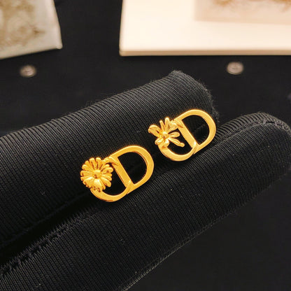 Dior Brass Sunburst Earrings