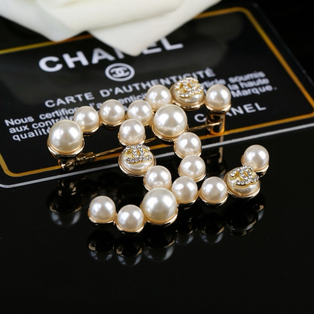 Chanel Brass Pearl Brooch