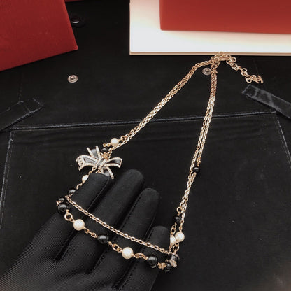 Chanel Black Brass Bow Necklace