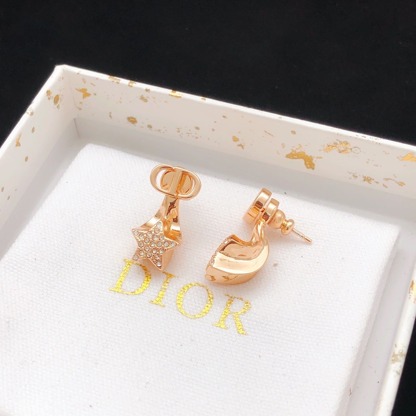 Dior Gold Brass Star Earrings