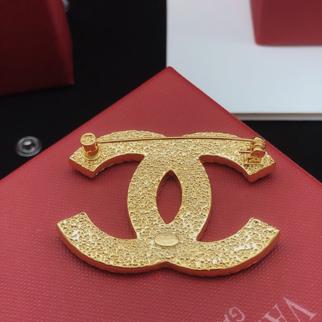 Chanel Brass Brooch