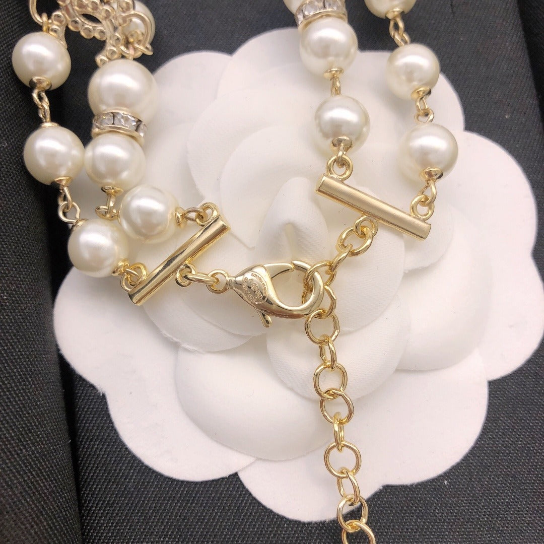 Chanel Brass & Sterling Silver Bow Necklace