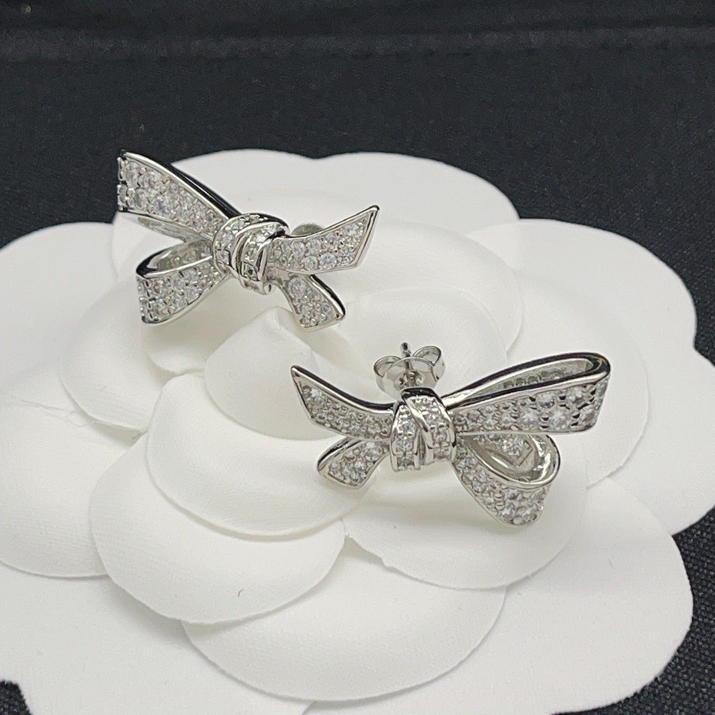 Graff Silver Brass Bow Earrings
