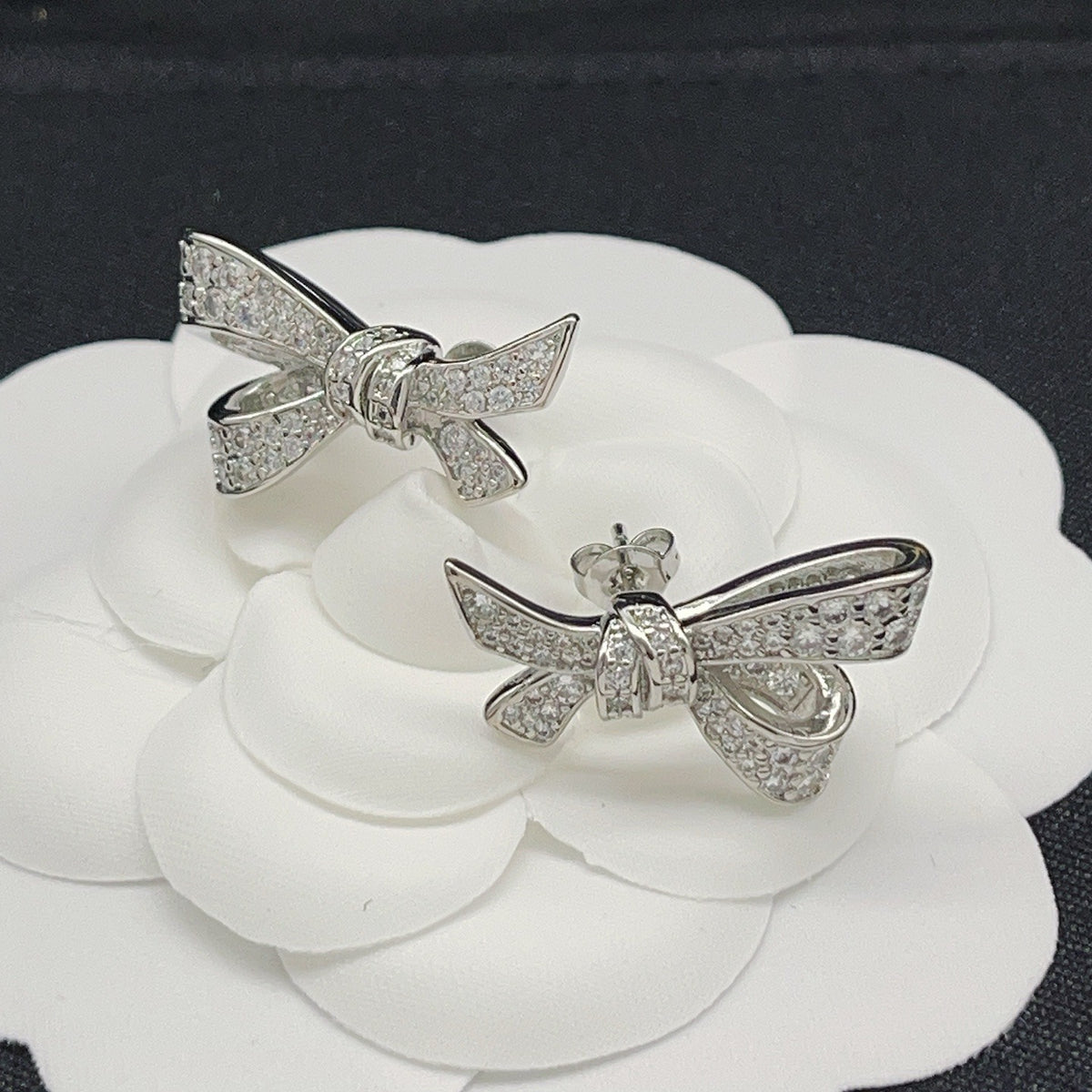 Graff Silver Brass Bow Earrings