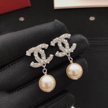Chanel Brass Pearl Earrings