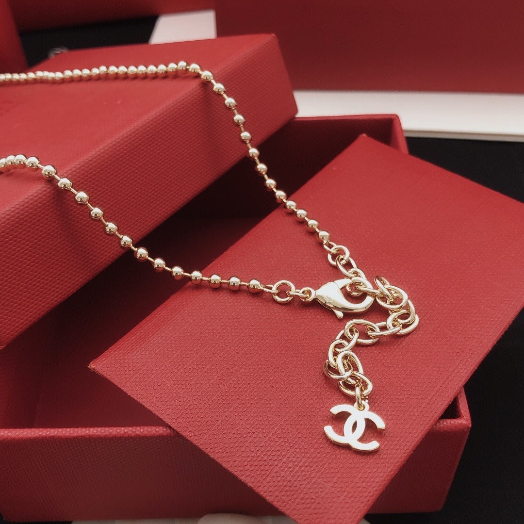 Chanel Brass Heart Necklace