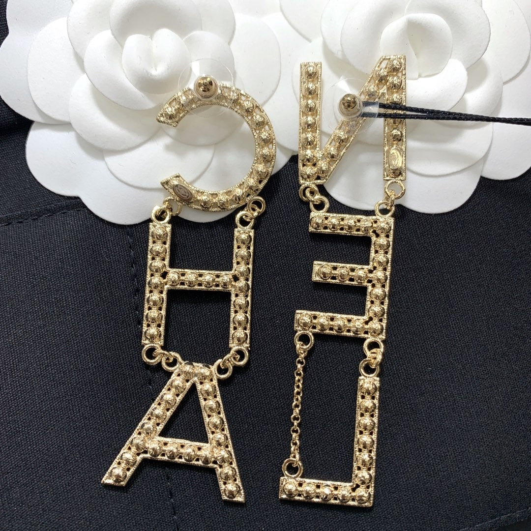 Chanel Brass & Sterling Silver Logo Earrings