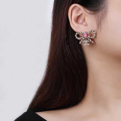 Chanel Brass Bow Earrings