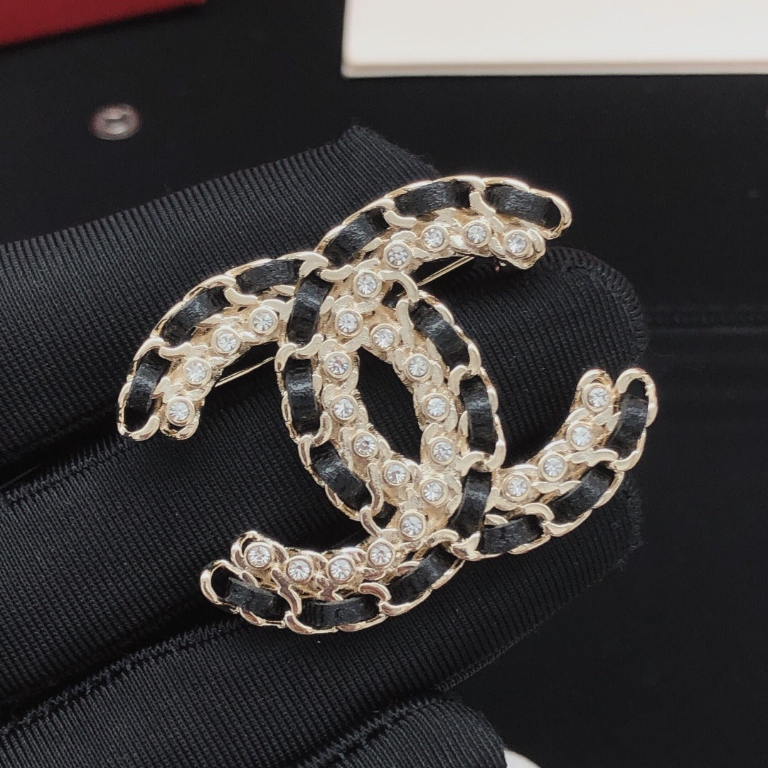 Chanel Leather & Brass Brooch