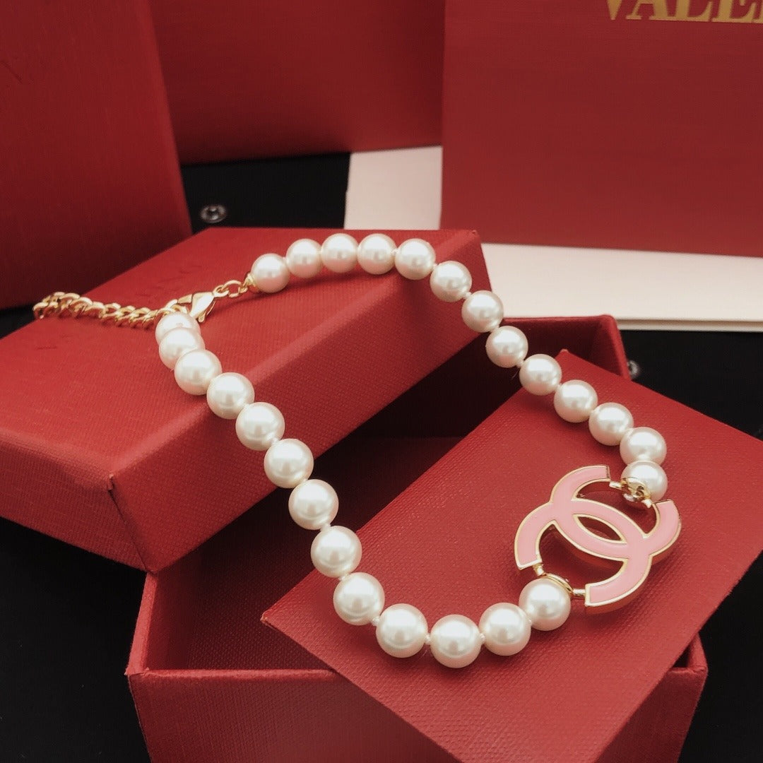 Chanel Pink Brass Pearl Necklace