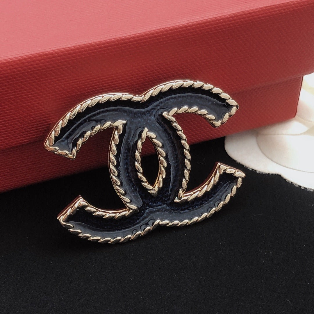 Chanel Brass Brooch