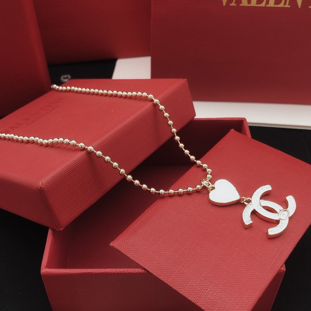 Chanel Brass Heart Necklace