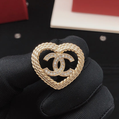Chanel Brass Heart Earrings
