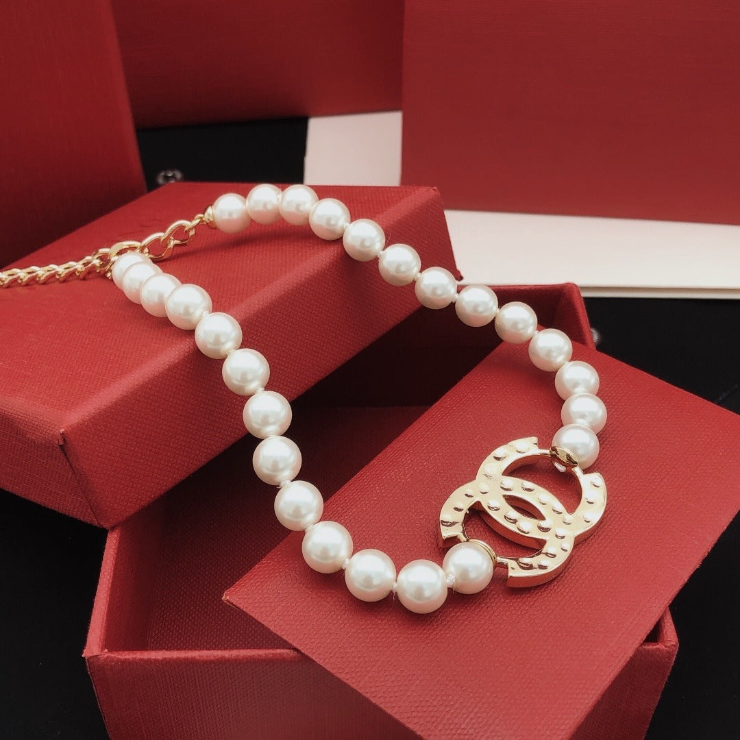 Chanel Pink Brass Pearl Necklace