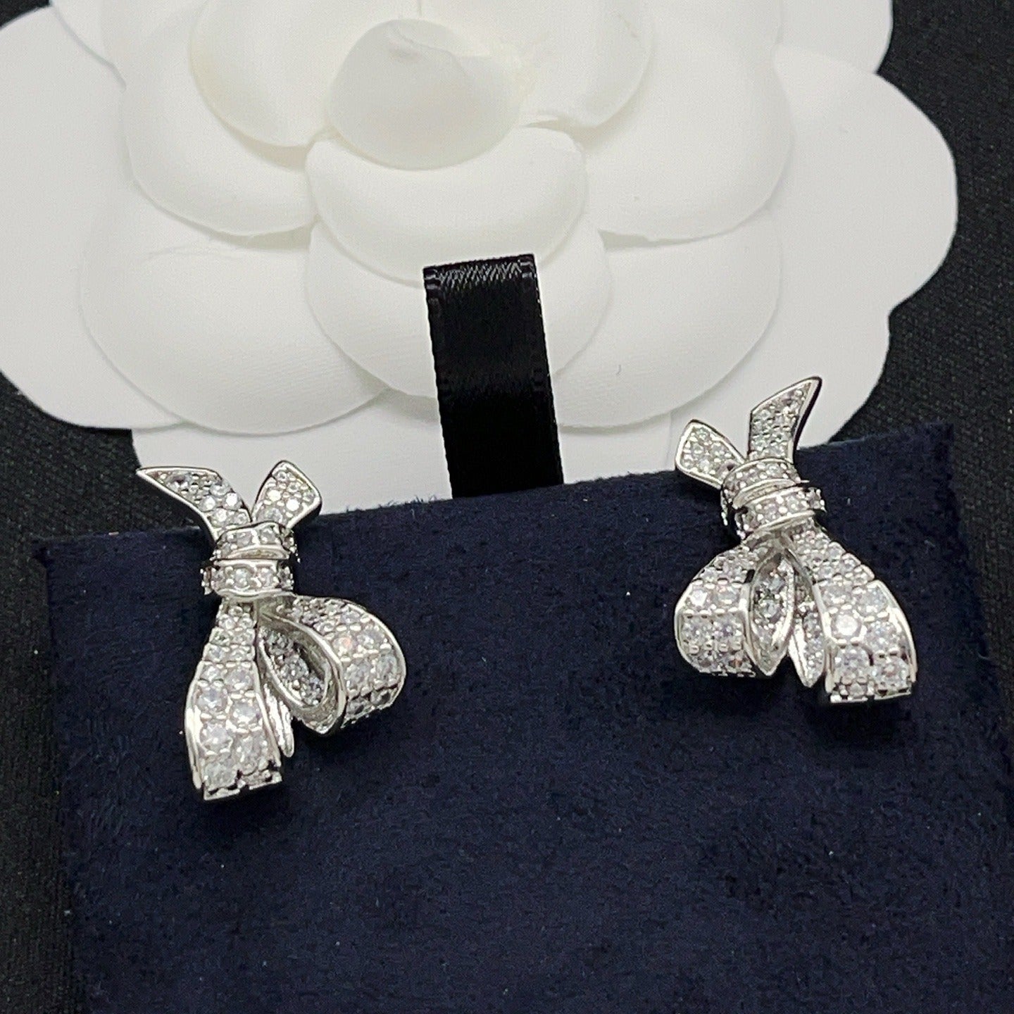 Graff Silver Brass Bow Earrings