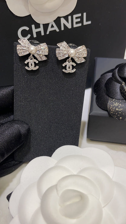 Chanel Silver Bow Earrings