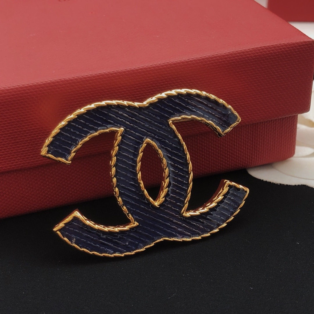 Chanel Brass Brooch