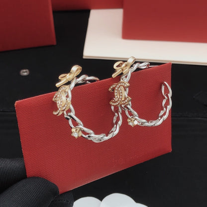 Chanel Brass Bow Earrings