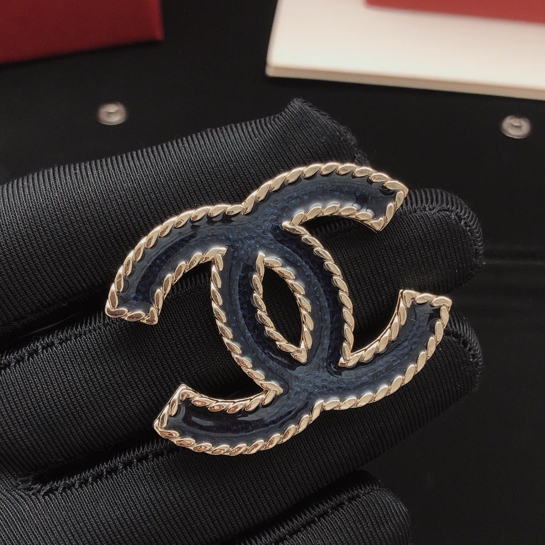 Chanel Brass Brooch