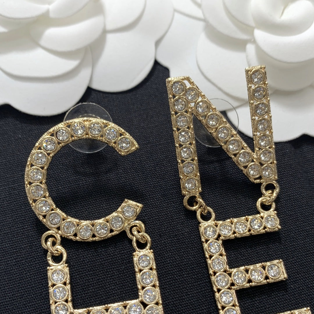 Chanel Brass & Sterling Silver Logo Earrings