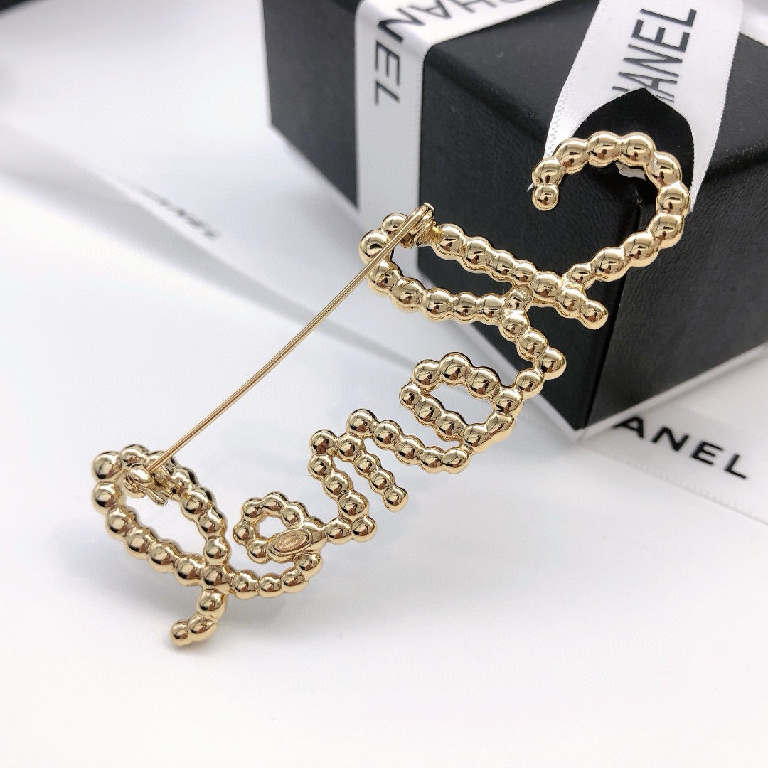 Chanel Pearl Brooch