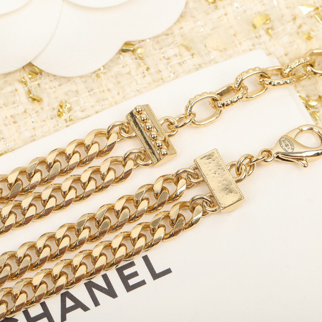 Chanel Black Brass Logo Necklace