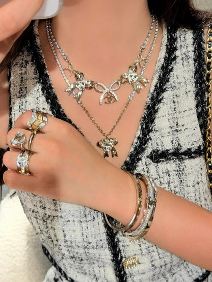 Chanel Brass Bow Necklace