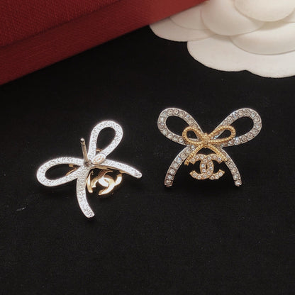 Chanel Brass Bow Earrings