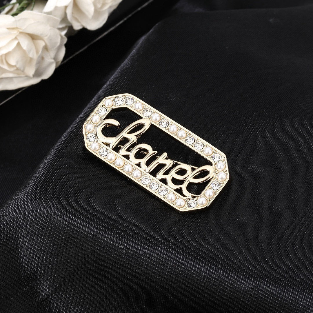 Chanel Logo Brooch