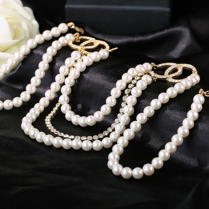 Chanel Brass Pearl Necklace
