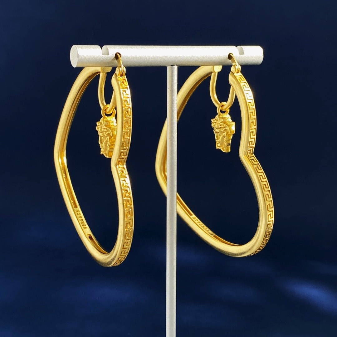 Versace Gold Brass Heart Earrings