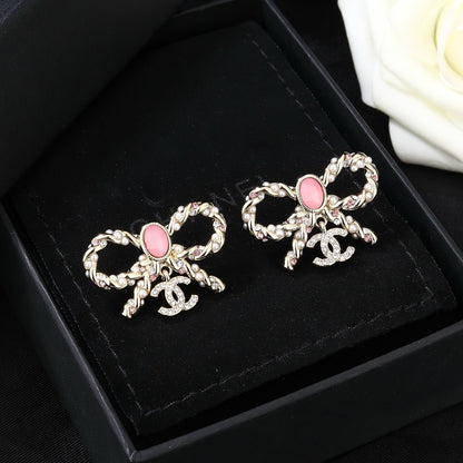 Chanel Brass Bow Earrings