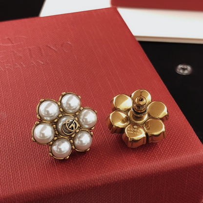 Gucci Gold Brass Floral Earrings