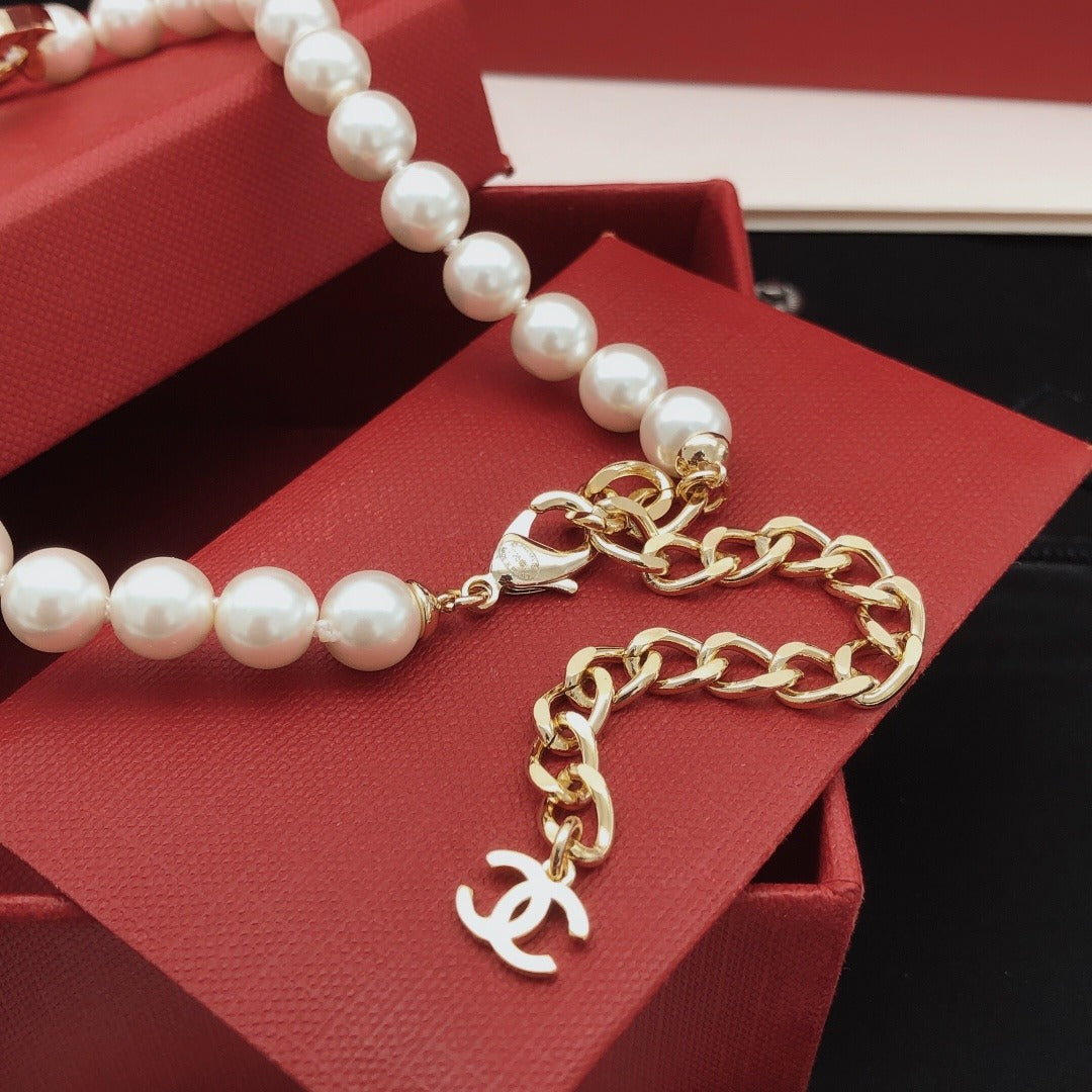 Chanel Pink Brass Pearl Necklace