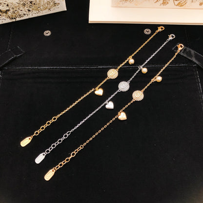 Dior Gold Brass Heart Bracelet