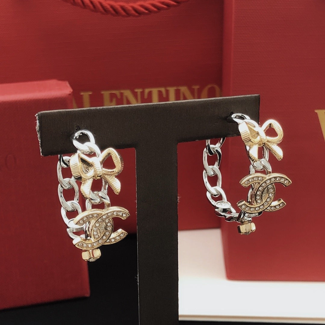 Chanel Brass Bow Earrings