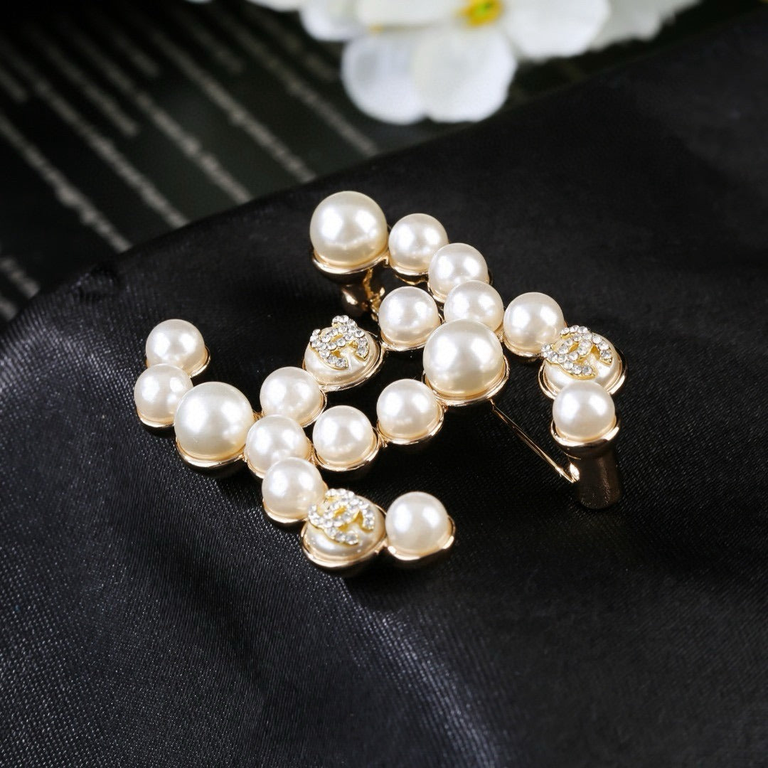 Chanel Brass Pearl Brooch