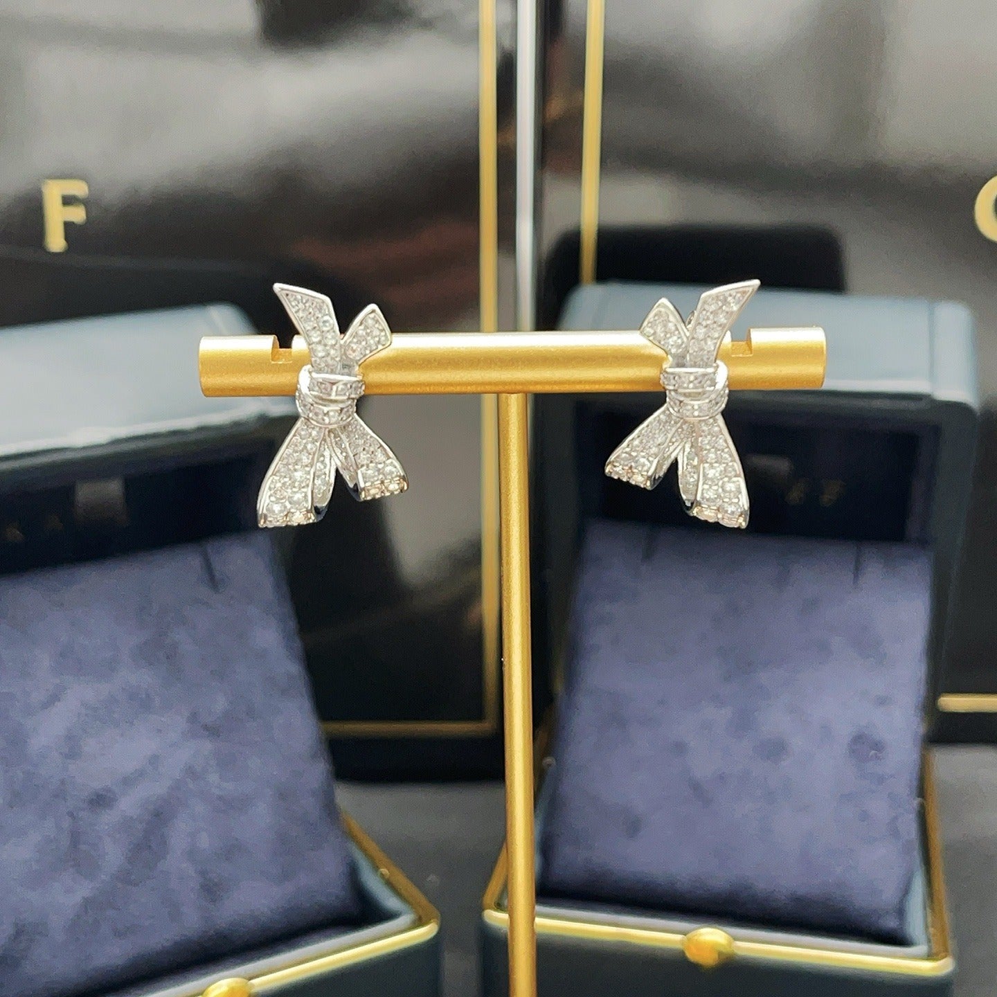 Graff Silver Brass Bow Earrings