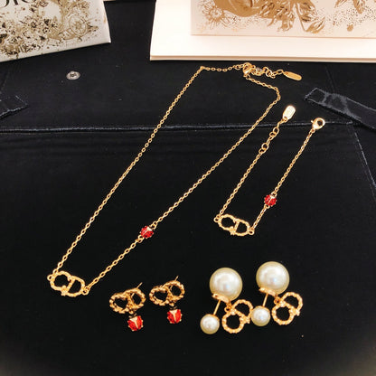 Dior Gold Brass Pearl Earrings